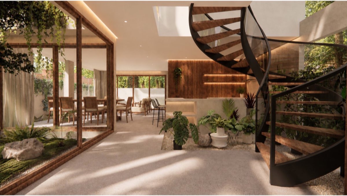 Interior looking out through full-height glazing to a planted light-well, with the steel and teak spiral stair beyond
