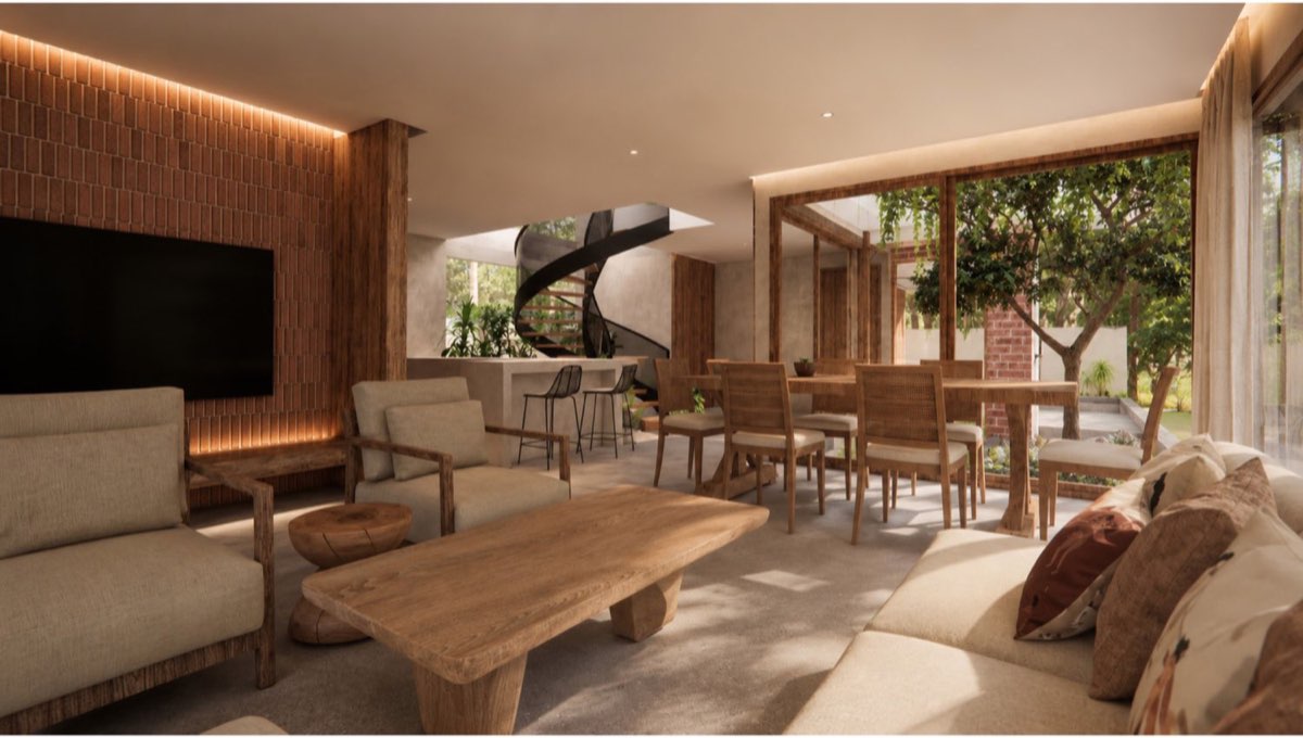 Living room with sofa and low timber table, dining table beyond and the spiral stair rising at the far end